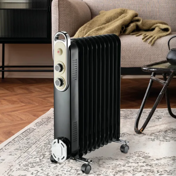 Radiador de aceite portátil de color negro con controles manuales, ideal para calefacción en interiores durante el invierno, ofreciendo eficiencia energética y distribución de calor uniforme.